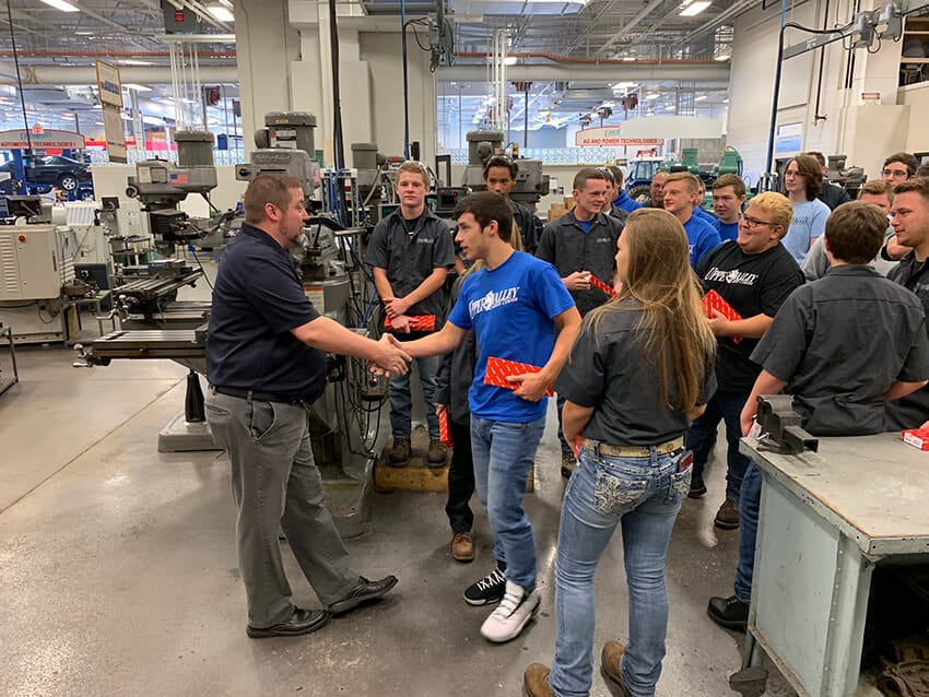 100 Ton Hydraulic Press Manufacturer Worker Shaking Hands With Student
